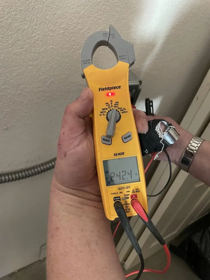 Voltage testing with clamp meter during Circuit Breaker Repair in Fremont